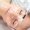Close-up beautician doctor hand making anti-age procedure apply peeling acid young attractive female client at beauty clinic. Cosmetologist specialist doing skincare treatment. Health care therapy.